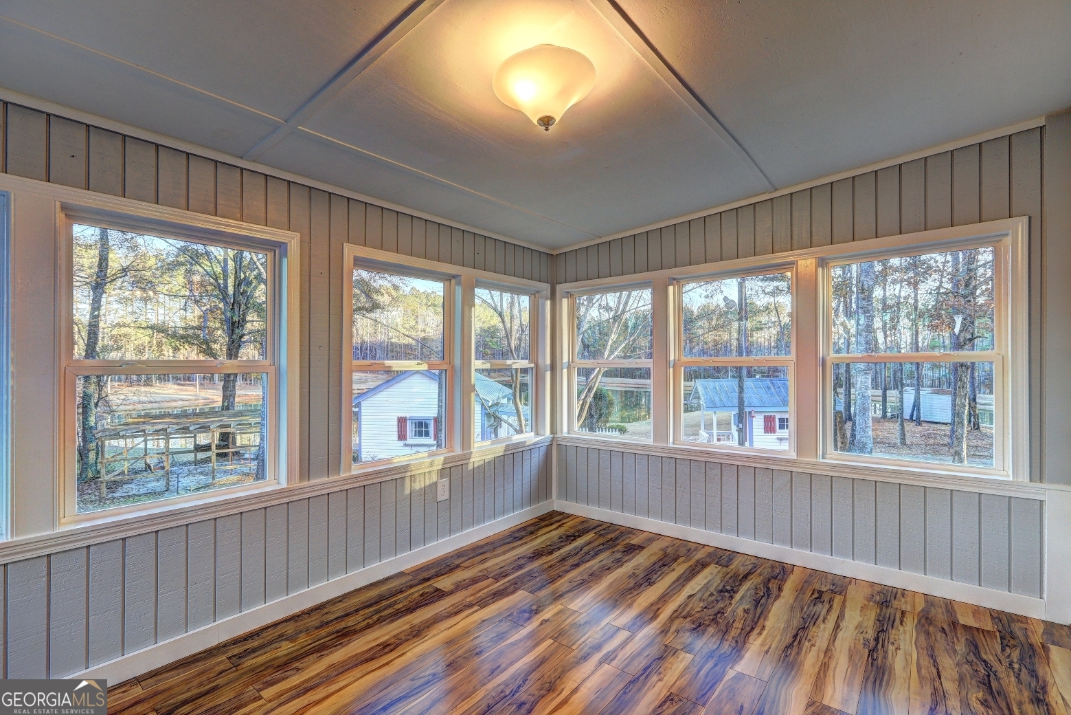 218 City Pond Road Barnesville, GA 30204 - Photo 40 of 51 a view of an empty room with wooden floor and a window