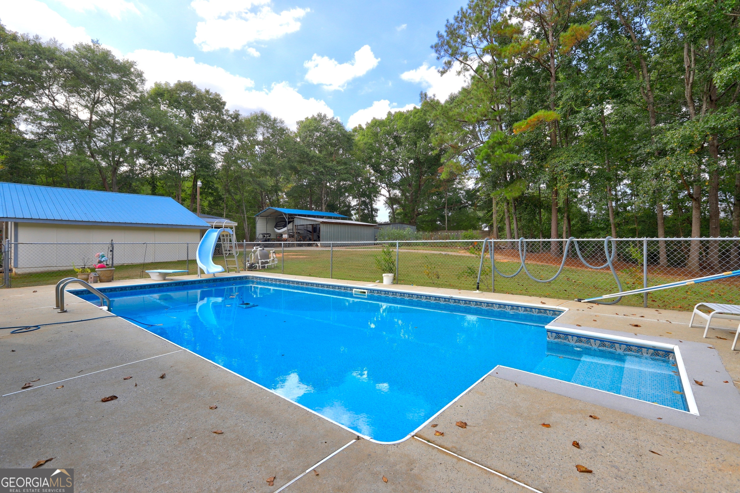 218 City Pond Road Barnesville, GA 30204 - Photo 43 of 51 a view of a backyard with swimming pool