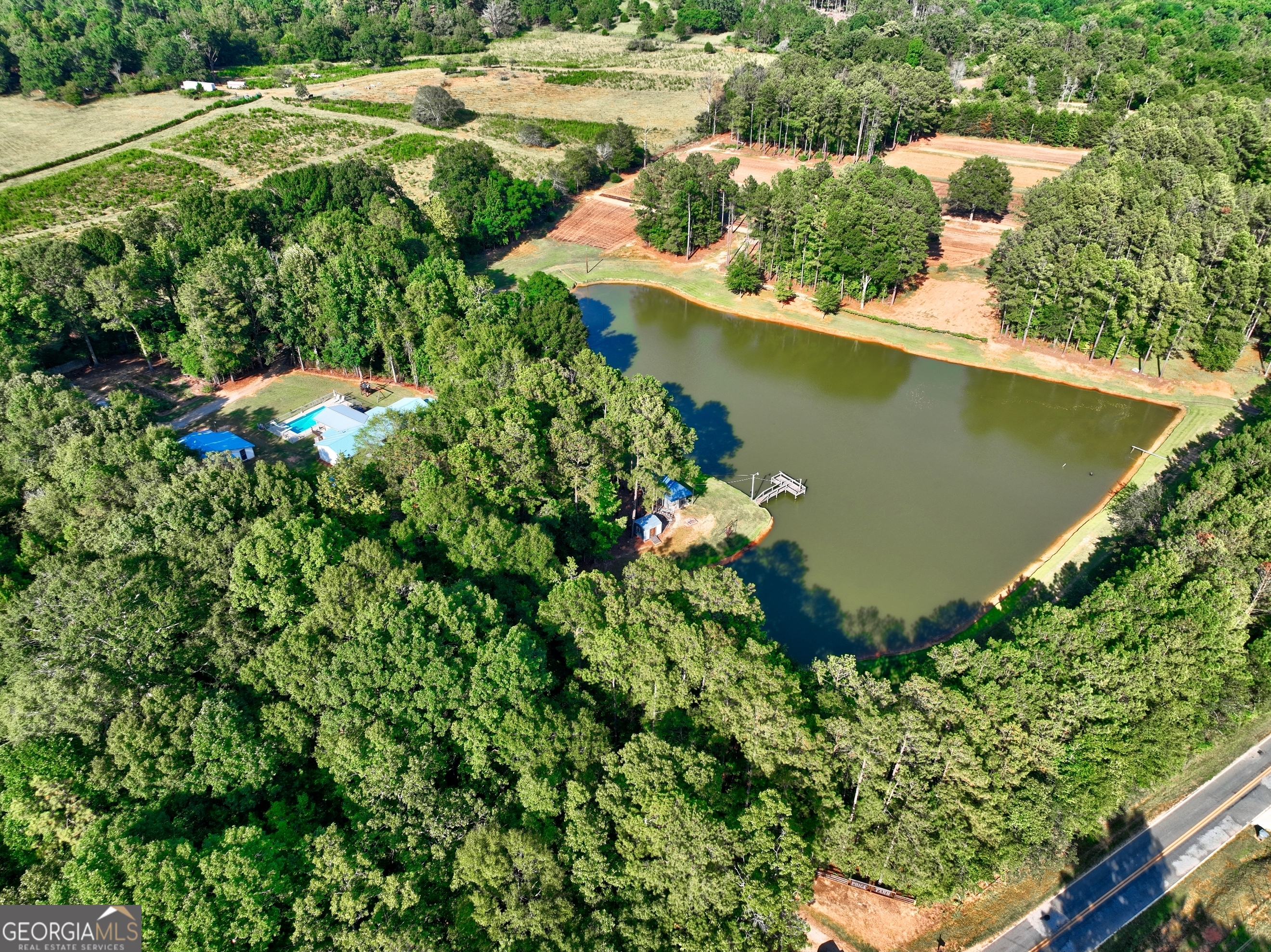 218 City Pond Road Barnesville, GA 30204 - Photo 51 of 51 an aerial view of a house with a yard and lake view