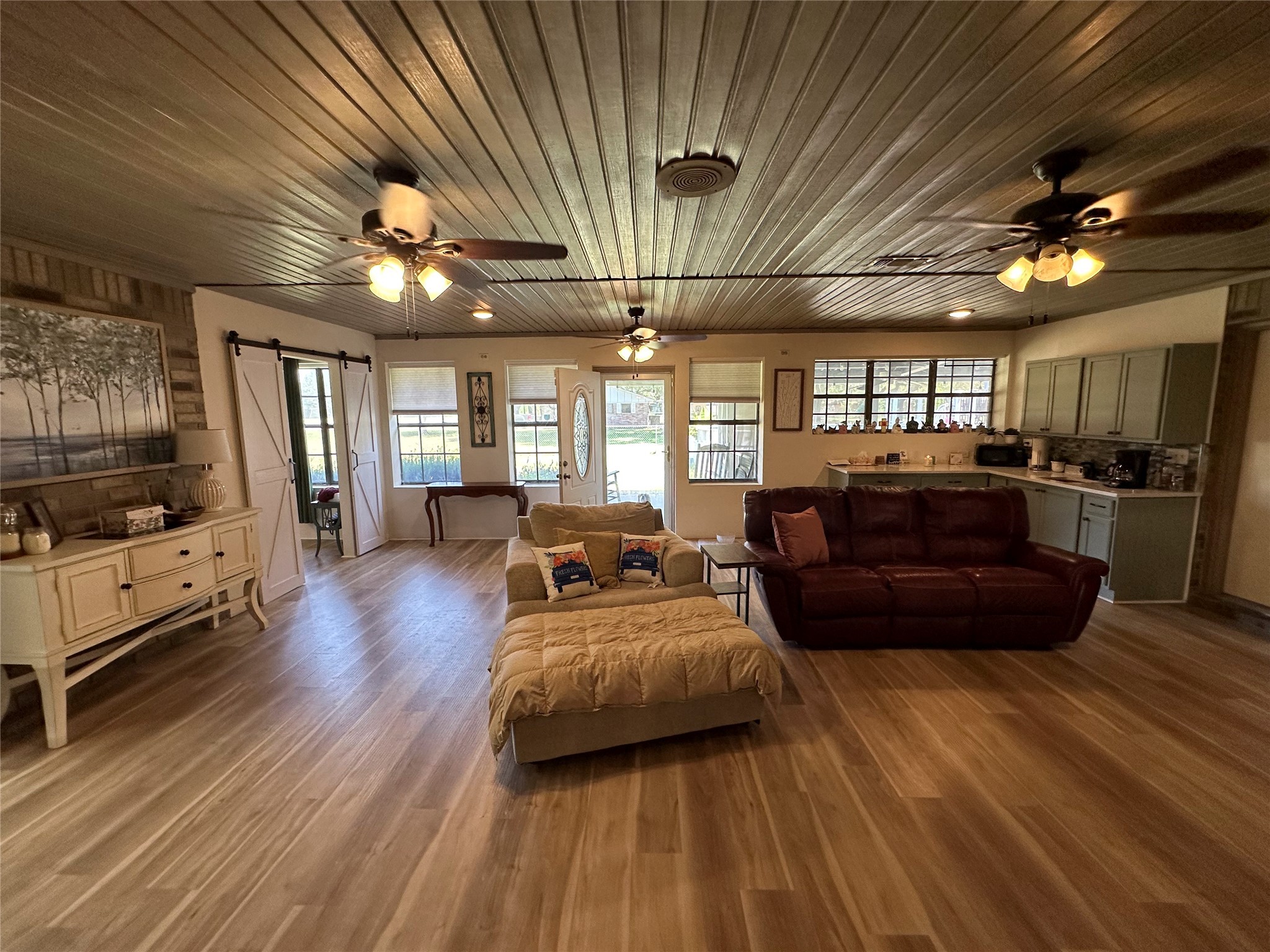 2012 Wilson Road El Campo, TX 77437 - Photo 20 of 50 a living room with furniture and a flat screen tv