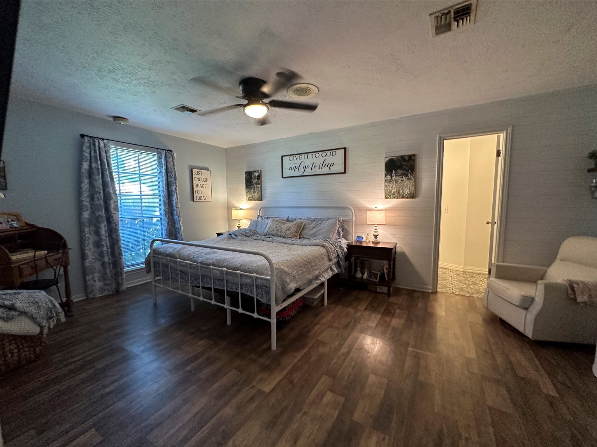 2012 Wilson Road El Campo, TX 77437 - Photo 23 of 50 a bedroom with a bed and a couch