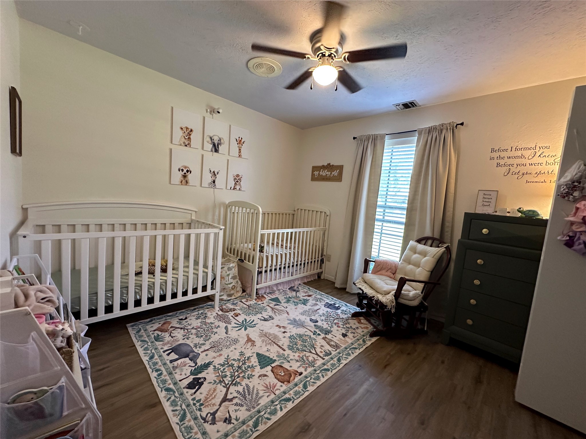 2012 Wilson Road El Campo, TX 77437 - Photo 24 of 50 a bedroom with a bed and wooden floor