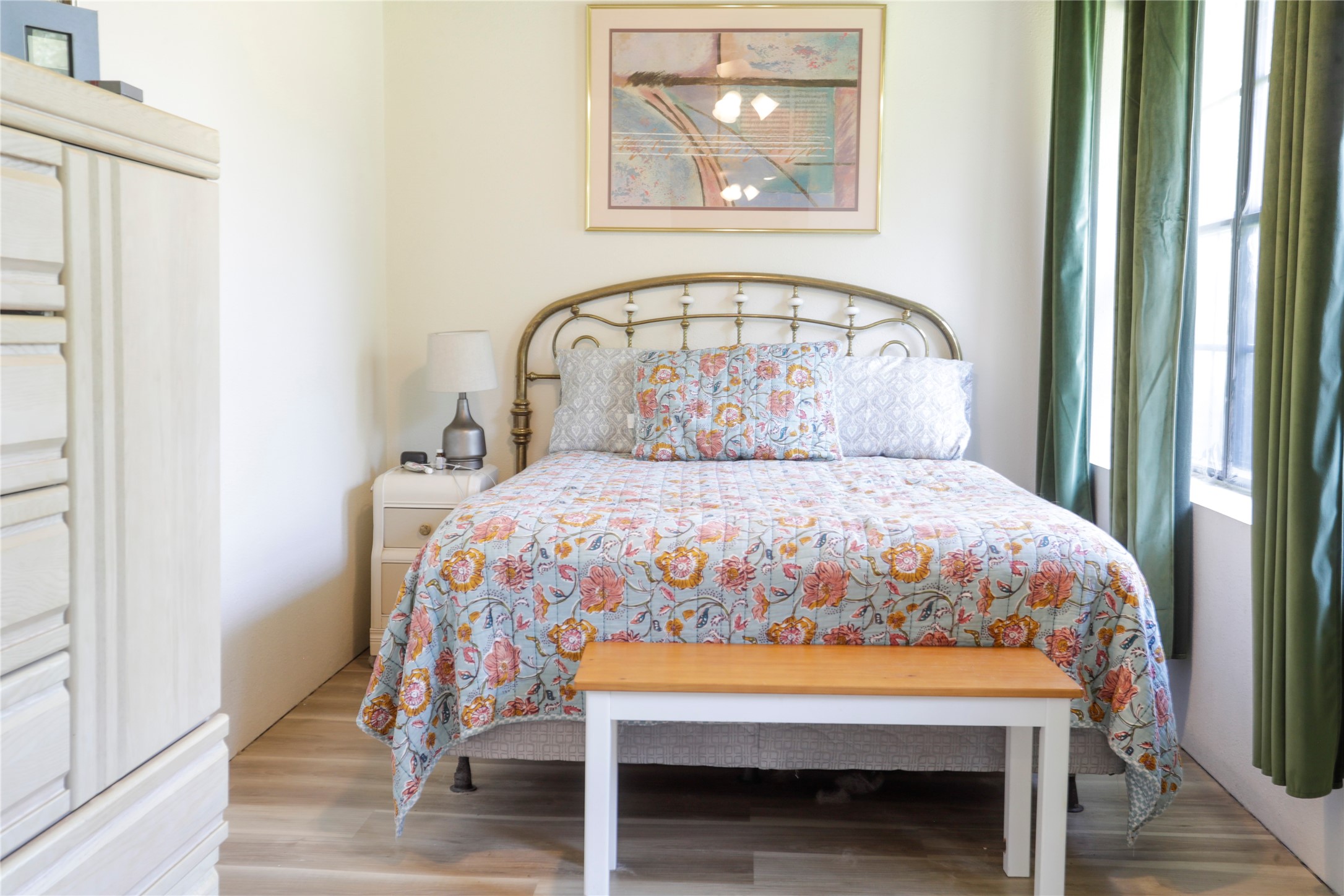 2012 Wilson Road El Campo, TX 77437 - Photo 32 of 50 a bed sitting in a bedroom next to a window