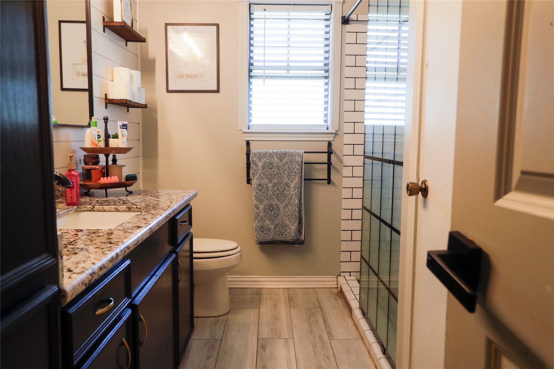 2012 Wilson Road El Campo, TX 77437 - Photo 42 of 50 a kitchen with stainless steel appliances granite countertop a sink stove and refrigerator