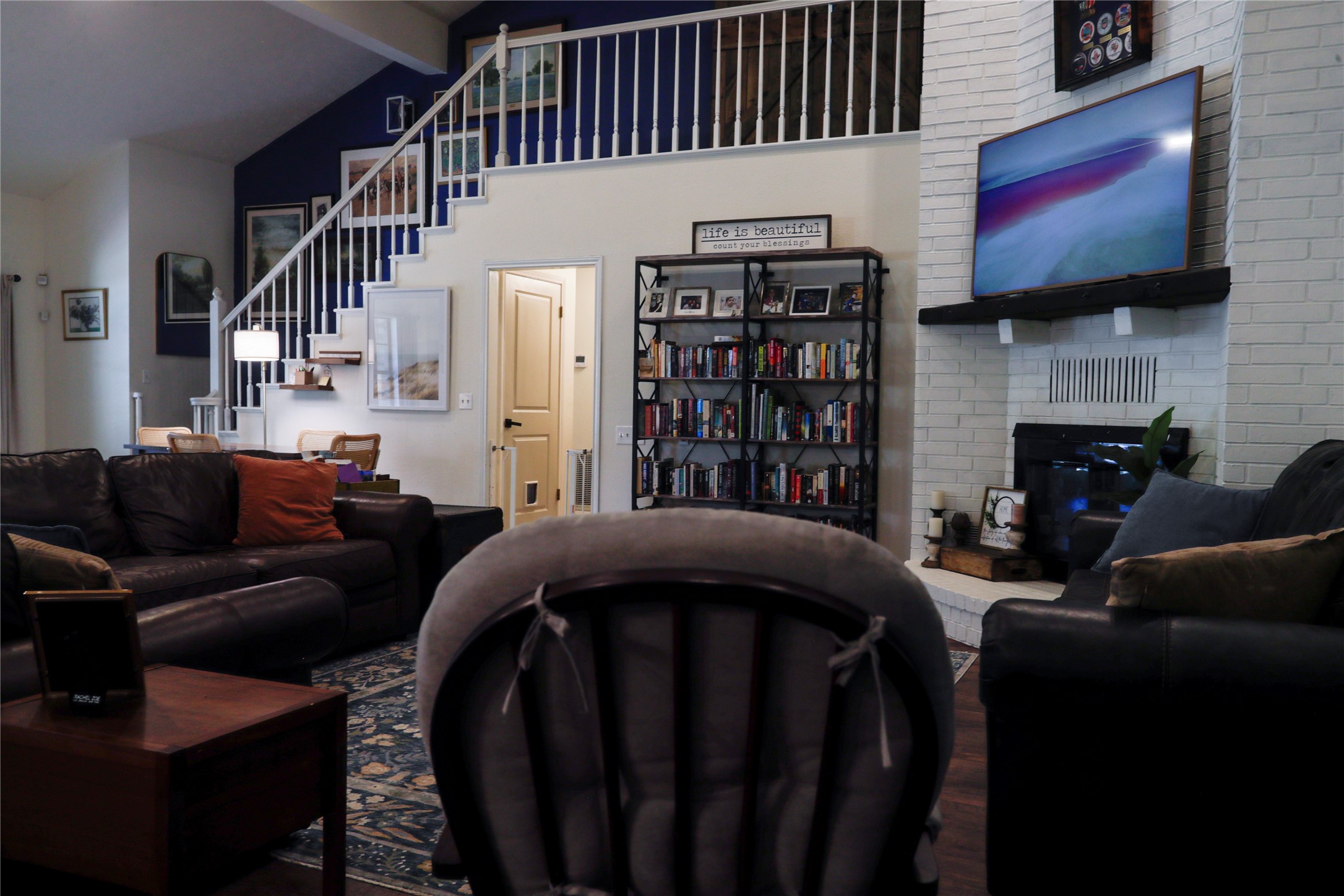 2012 Wilson Road El Campo, TX 77437 - Photo 46 of 50 a living room with fireplace furniture and a flat screen tv