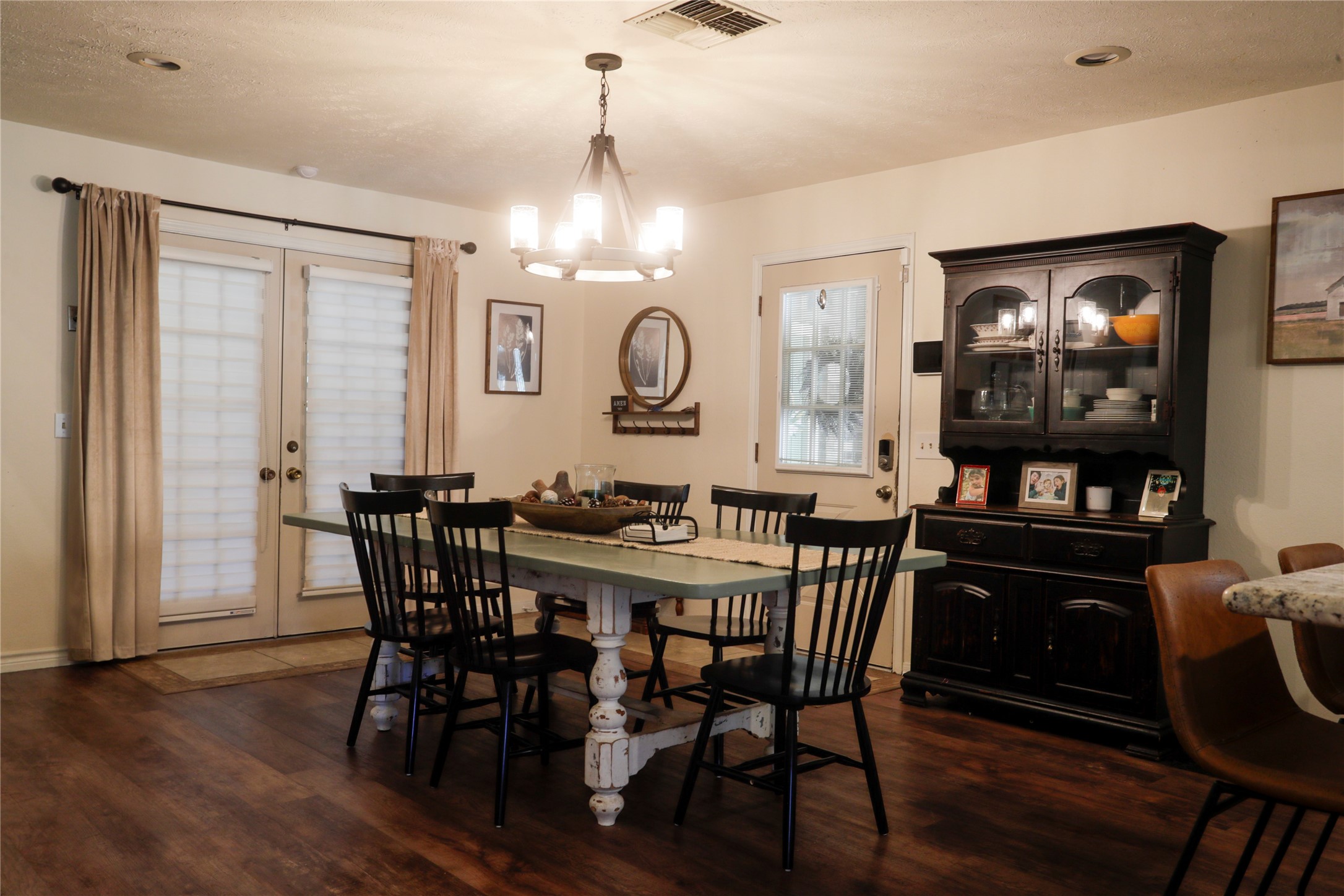 2012 Wilson Road El Campo, TX 77437 - Photo 48 of 50 a view of a a dining room with furniture window and wooden floor