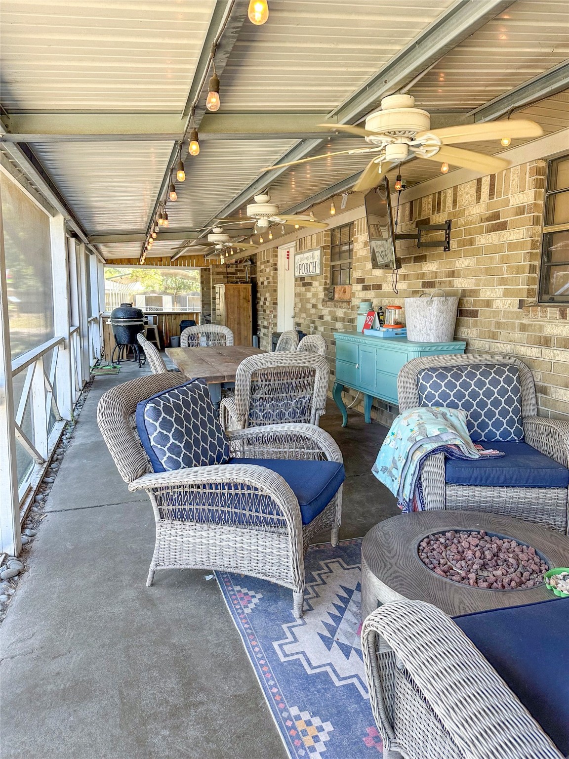 2012 Wilson Road El Campo, TX 77437 - Photo 10 of 50 a living room with furniture and a chandelier