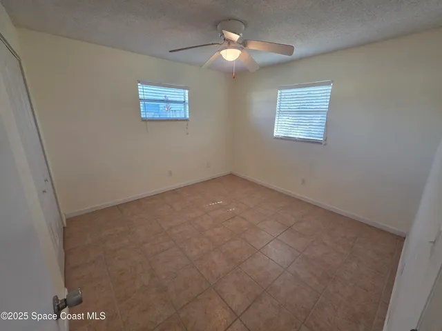 en empty room with windows