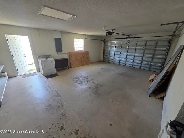 a view of livingroom with furniture and windows