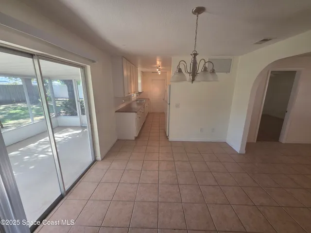 a view of a storage & utility room with a sink