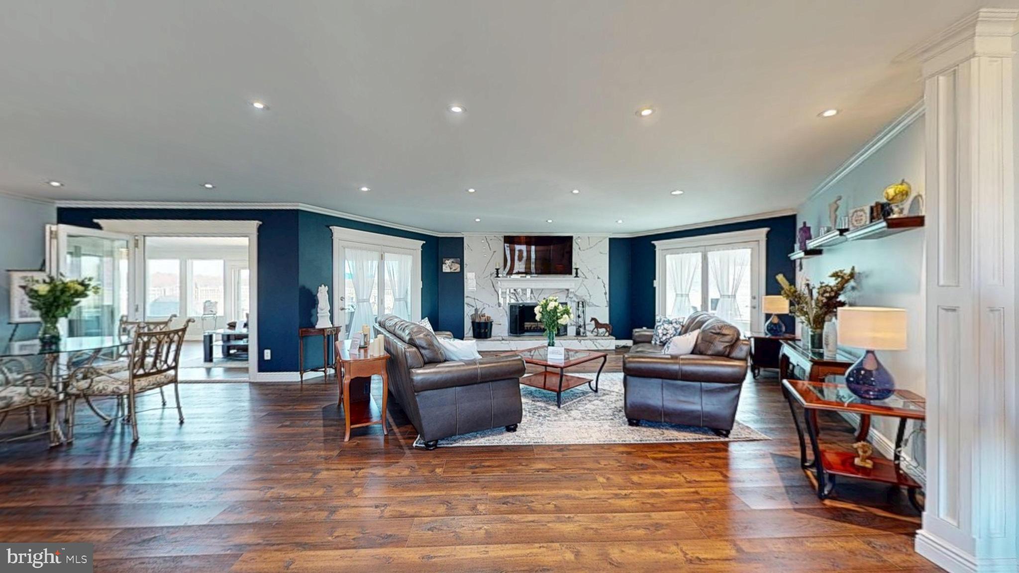 1400 Old Indian Mills Road Shamong, NJ 08088 - Photo 20 of 110 a living room with furniture and a wooden floor