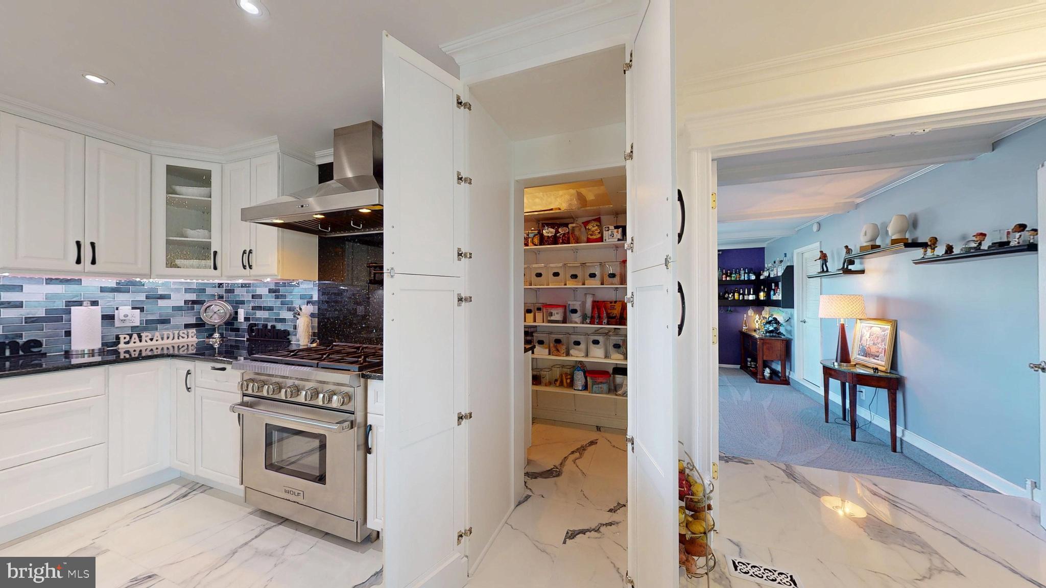 1400 Old Indian Mills Road Shamong, NJ 08088 - Photo 33 of 110 a kitchen with stainless steel appliances kitchen island granite countertop a refrigerator and a stove top oven