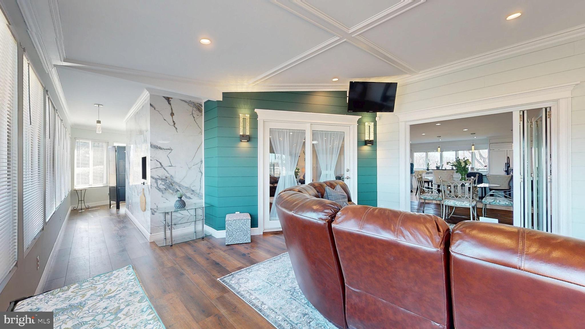 1400 Old Indian Mills Road Shamong, NJ 08088 - Photo 47 of 110 a living room with furniture and a wooden floor