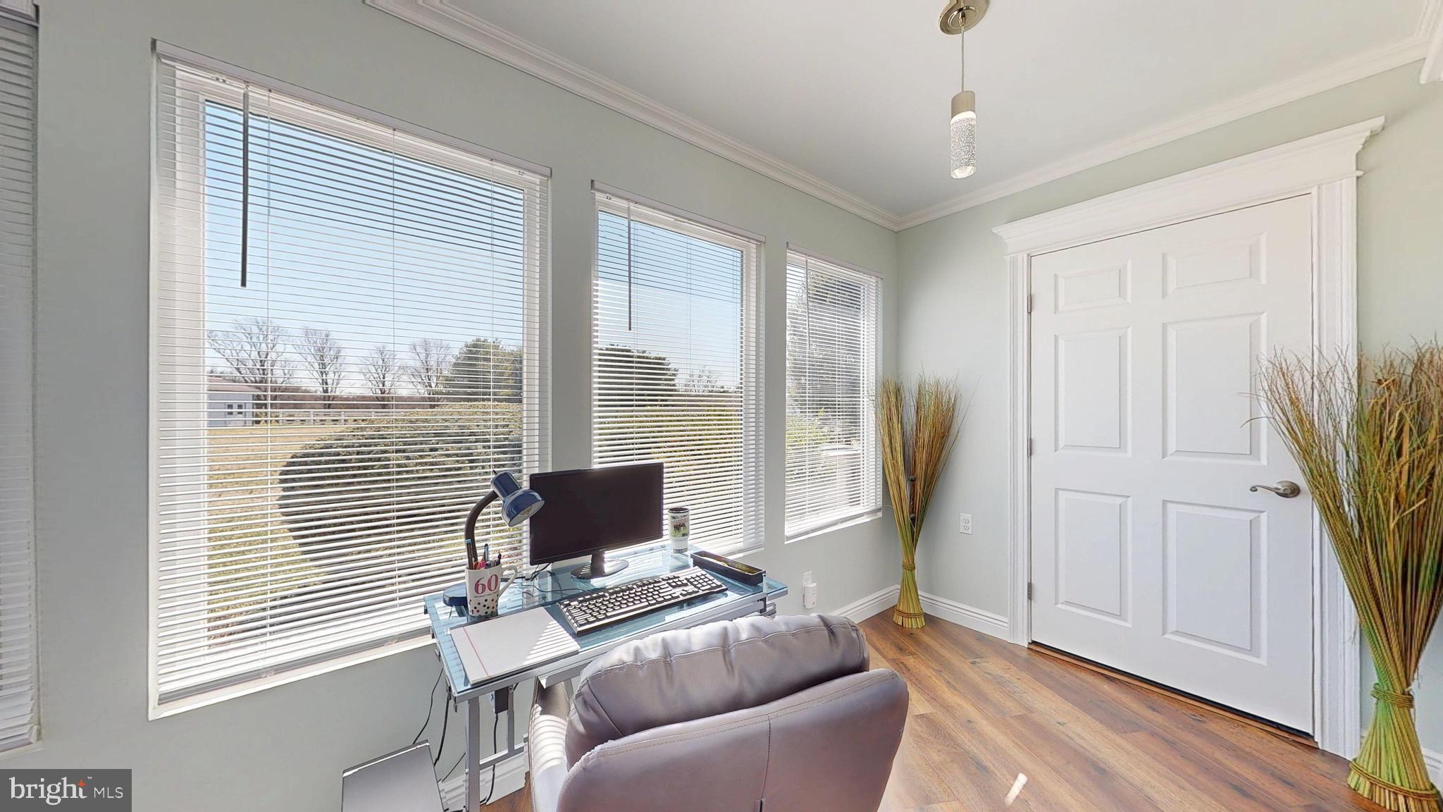 1400 Old Indian Mills Road Shamong, NJ 08088 - Photo 51 of 110 a living room with furniture and a flat screen tv