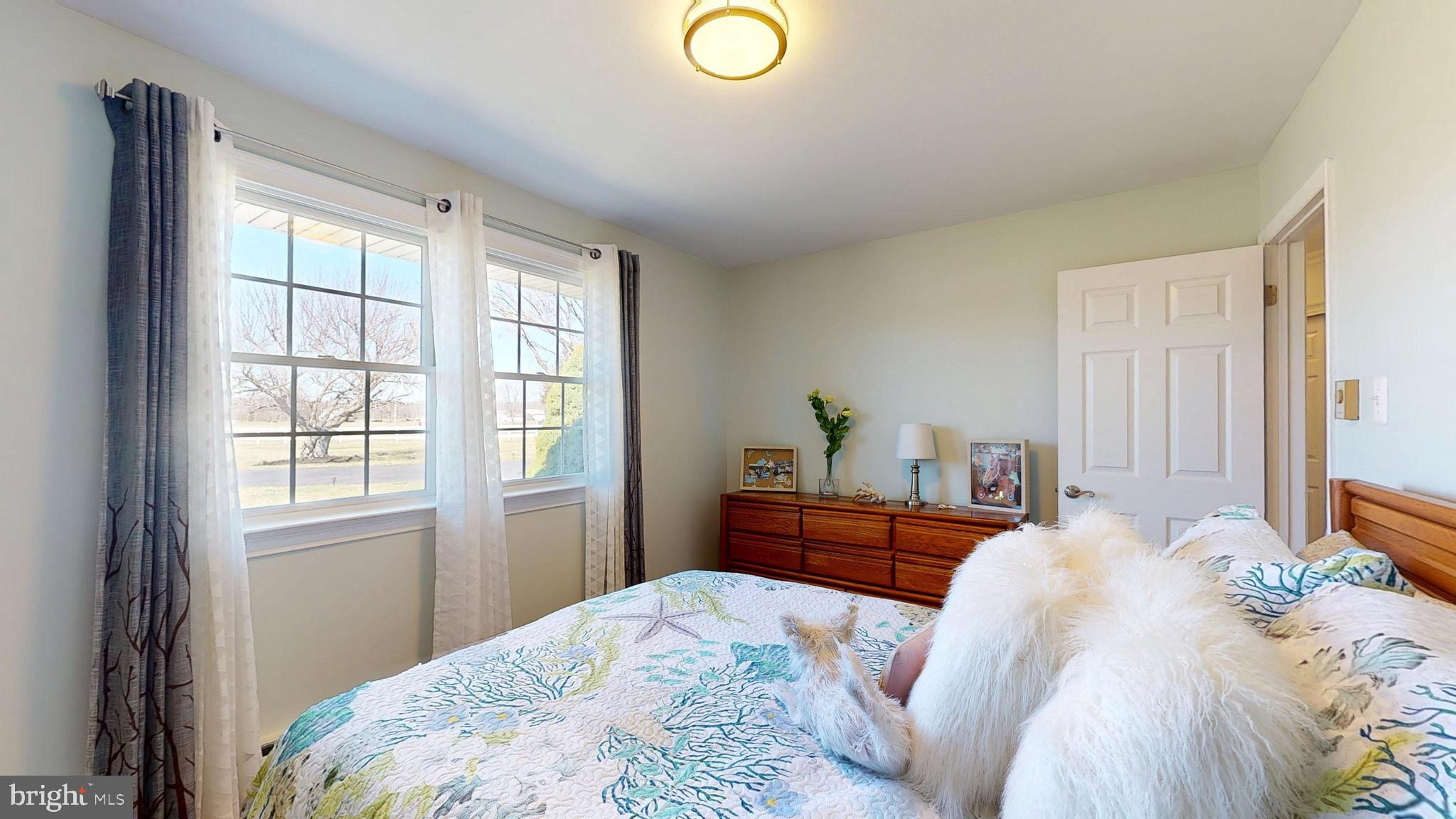 1400 Old Indian Mills Road Shamong, NJ 08088 - Photo 72 of 110 a bedroom with a bed and a window