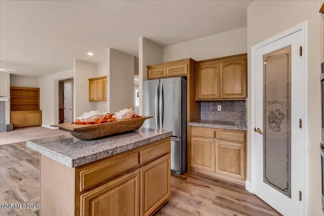 a bathroom with a toilet a sink a mirror and a bathtub