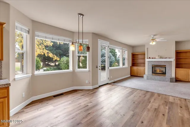an aerial view of residential building and lake
