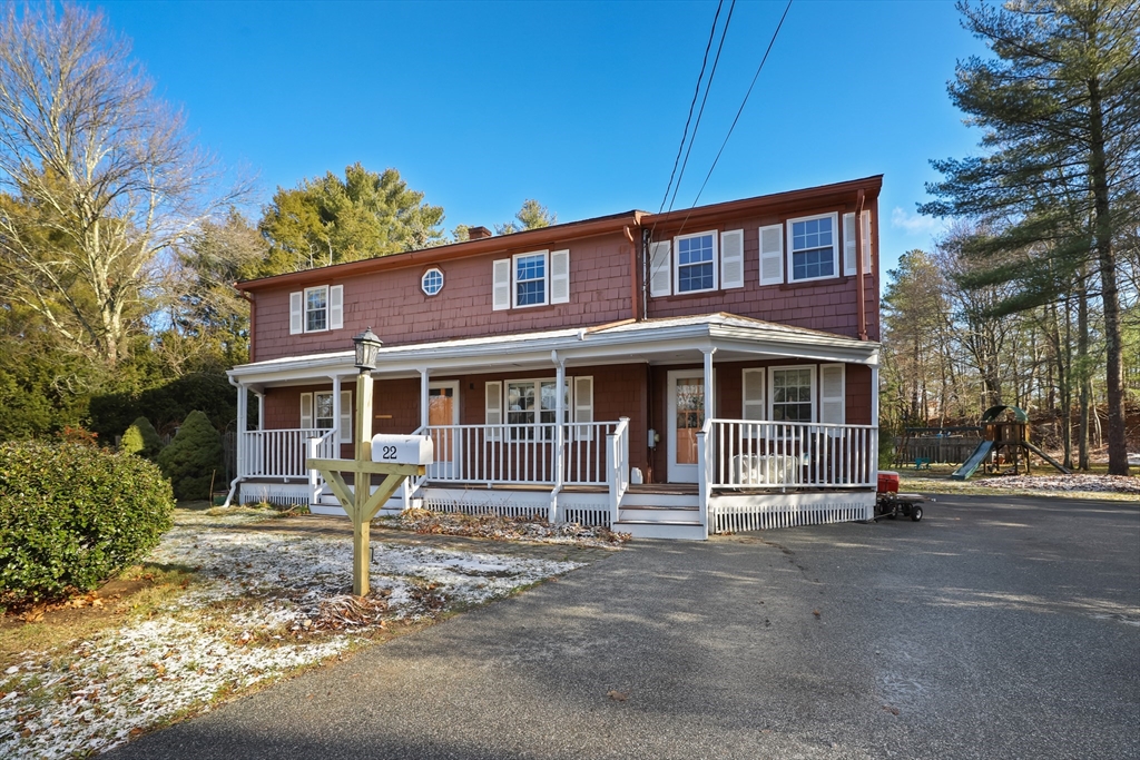 a front view of a house with a porch