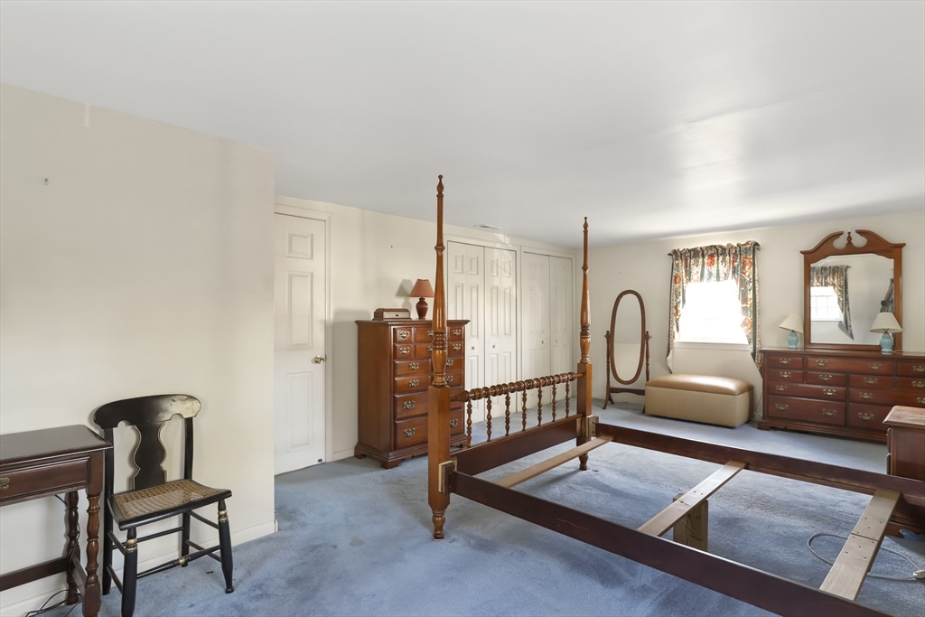 22 Coolidge Road Walpole, MA 02081 - Photo 14 of 25 a living room with furniture a rug and wooden floor
