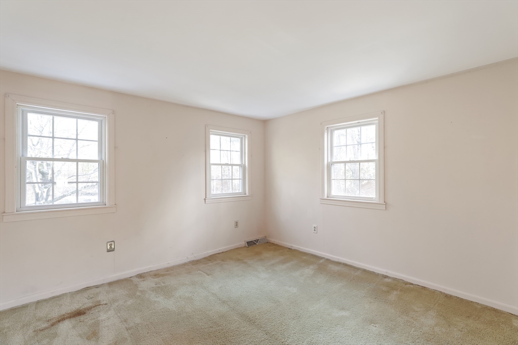22 Coolidge Road Walpole, MA 02081 - Photo 15 of 25 an empty room with windows