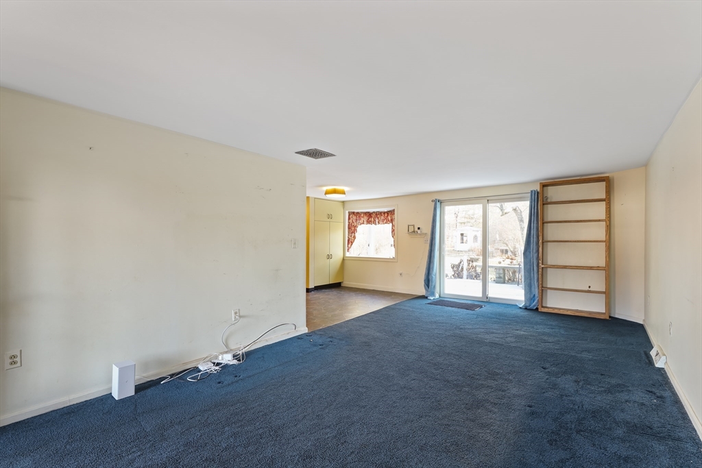 22 Coolidge Road Walpole, MA 02081 - Photo 10 of 25 an empty room with windows