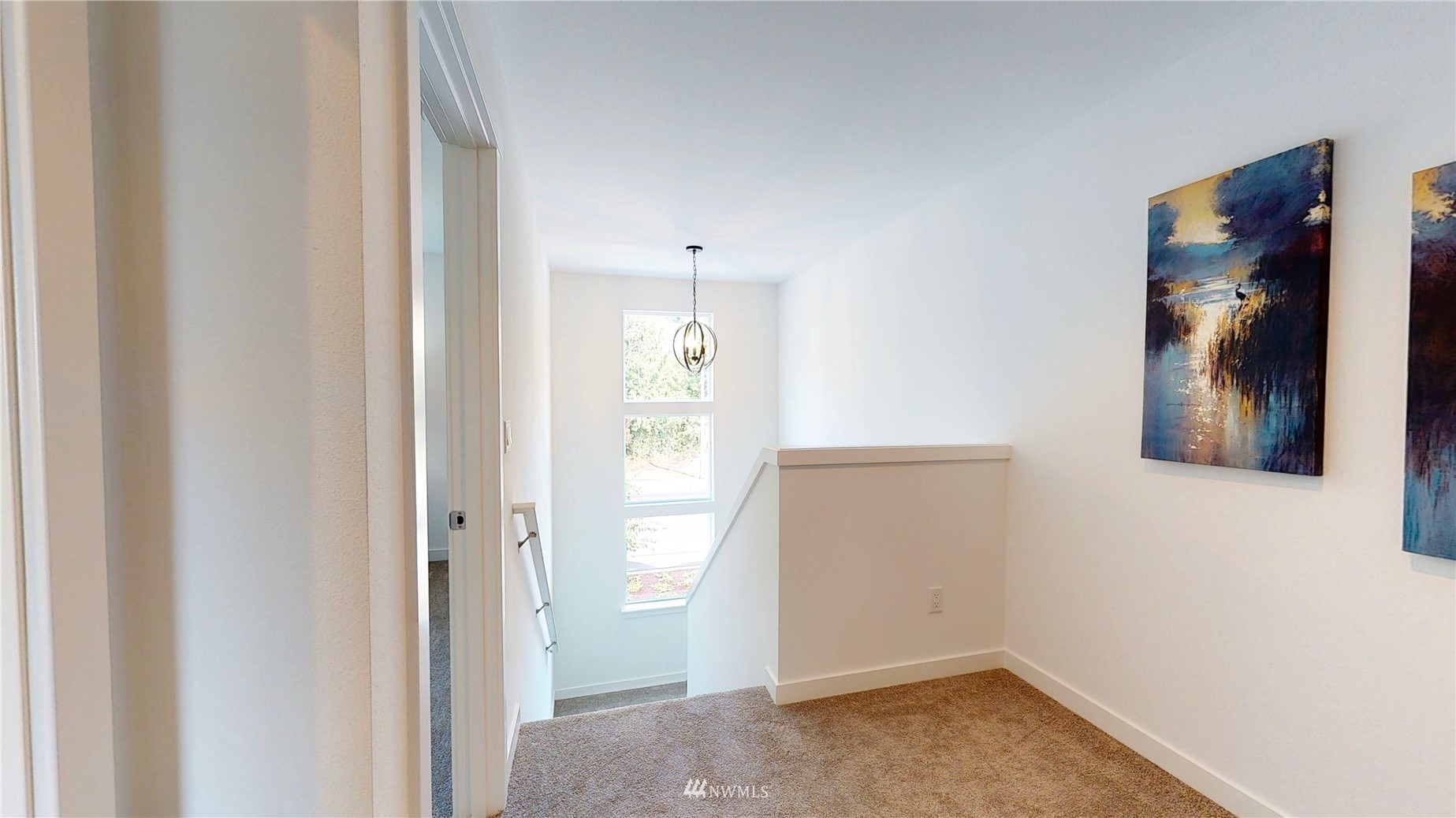 319 South 48th Court, Unit 13 Renton, WA 98055 - Photo 16 of 33 a view of an entryway with wooden floor