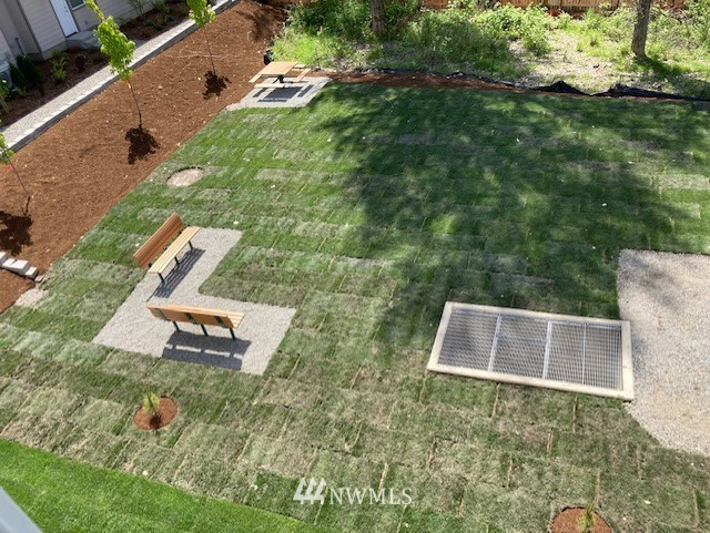 319 South 48th Court, Unit 13 Renton, WA 98055 - Photo 32 of 33 an aerial view of a house with a yard