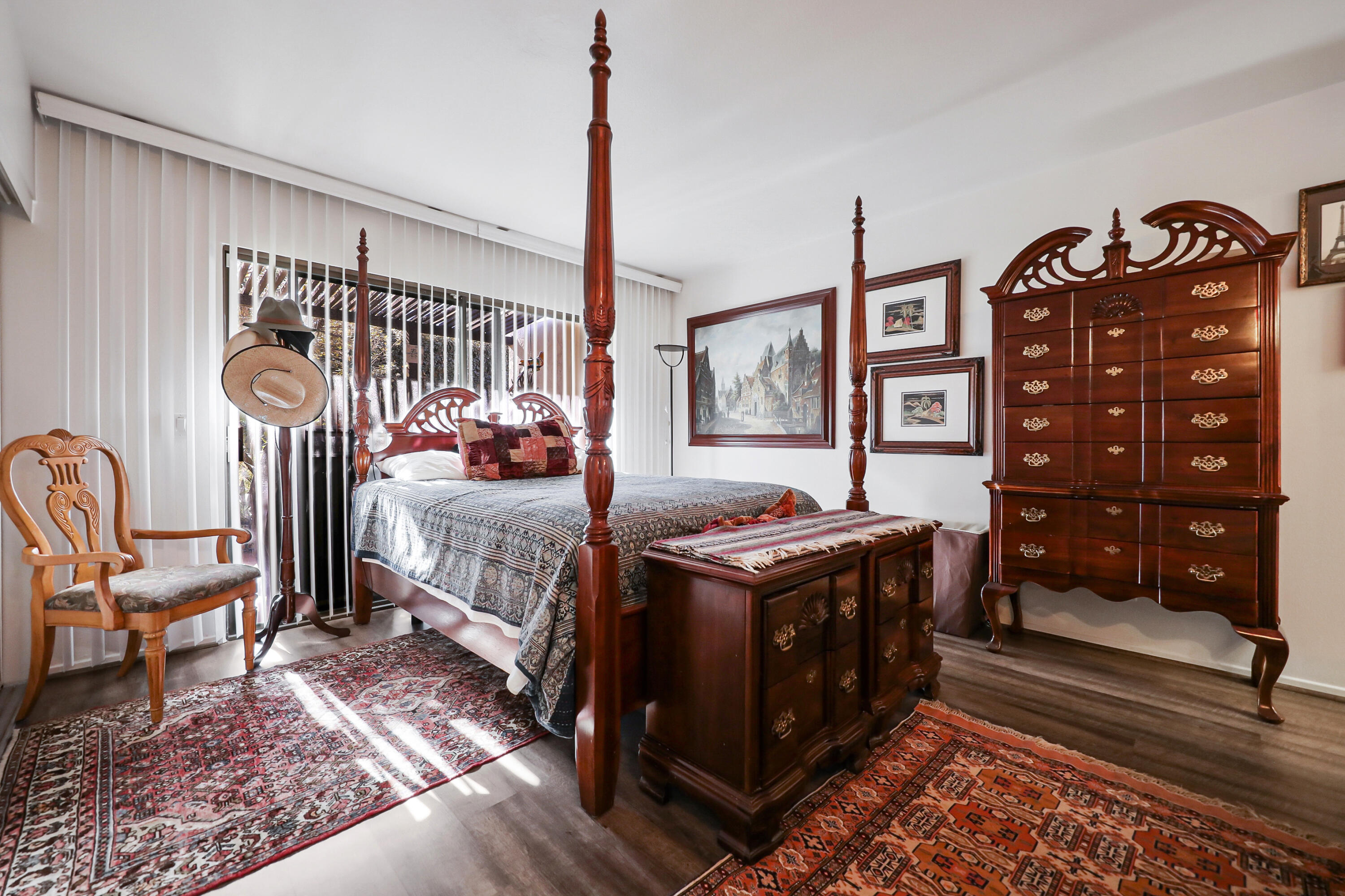 45760 Ocotillo Drive Palm Desert, CA 92260 - Photo 12 of 29 a bedroom with a bed and wooden floor