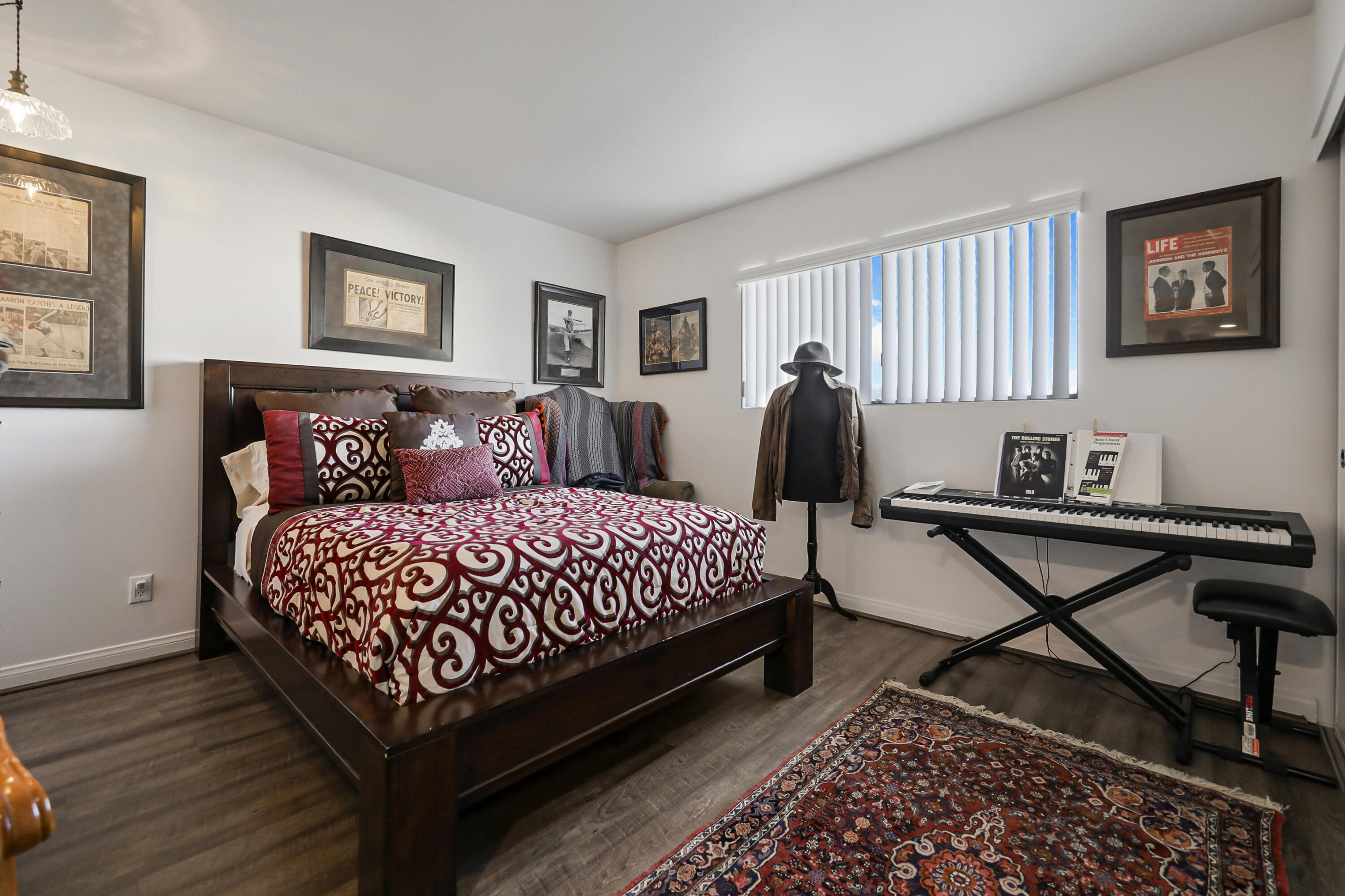 45760 Ocotillo Drive Palm Desert, CA 92260 - Photo 16 of 29 a bedroom with a bed a desk and chair with window