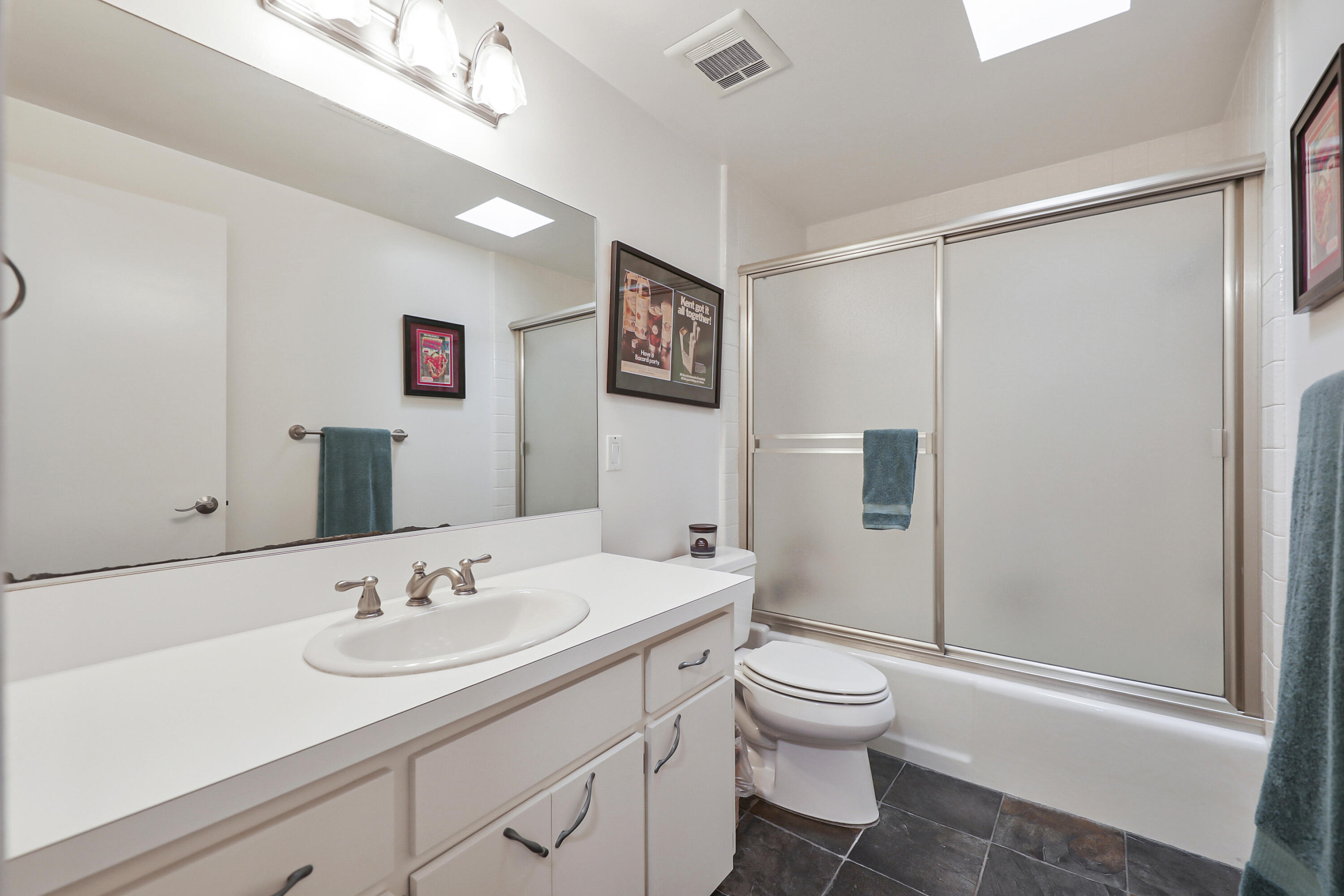 45760 Ocotillo Drive Palm Desert, CA 92260 - Photo 18 of 29 a bathroom with a toilet sink shower and mirror