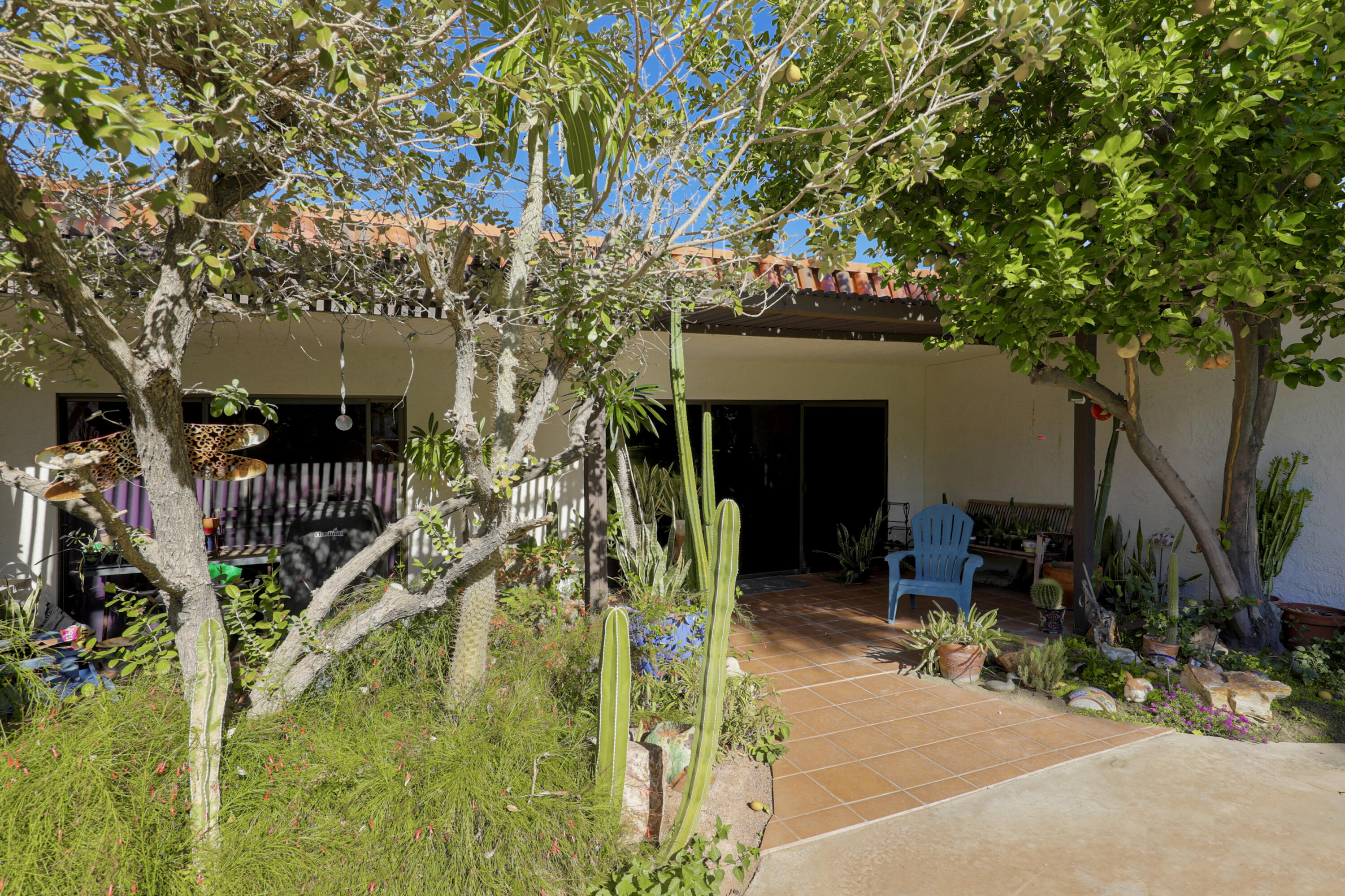 45760 Ocotillo Drive Palm Desert, CA 92260 - Photo 21 of 29 a view of outdoor space and porch