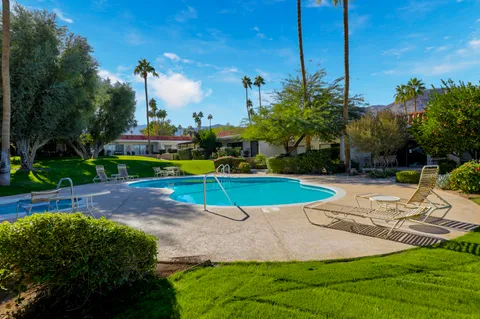 a view of a playground with a patio