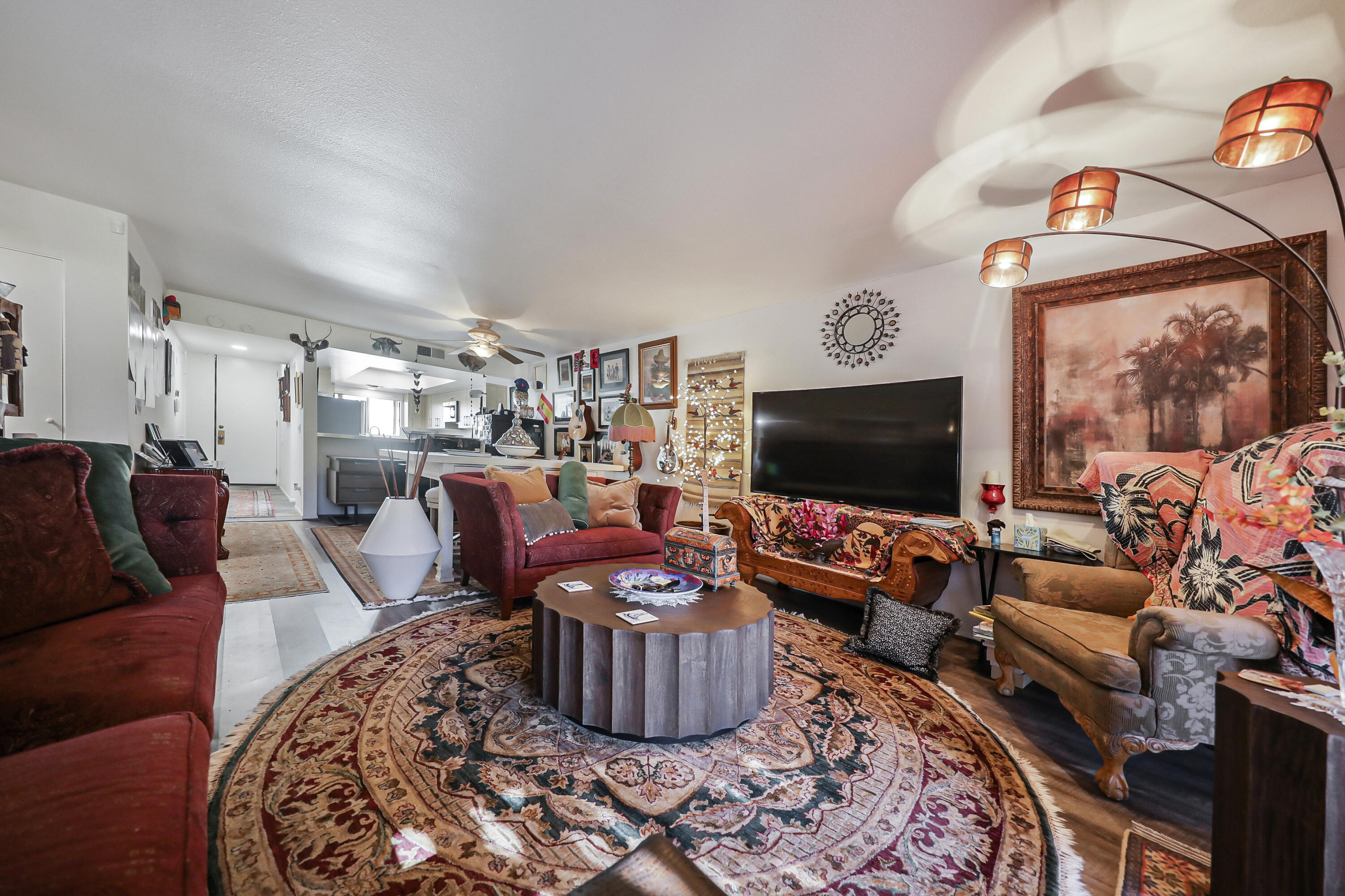45760 Ocotillo Drive Palm Desert, CA 92260 - Photo 6 of 29 a living room with furniture and a flat screen tv