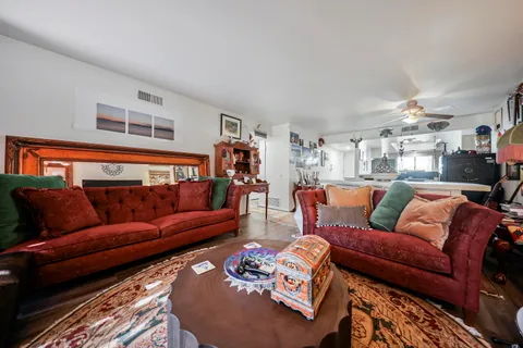 a living room with furniture and a couch