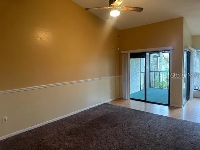 an empty room with sliding door