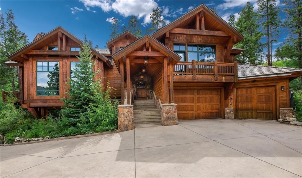 1050 4 O Clock Road Breckenridge, CO 80424 - Photo 1 of 35 a front view of a house with garden