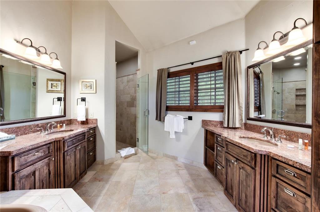 1050 4 O Clock Road Breckenridge, CO 80424 - Photo 19 of 35 a spacious bathroom with a sink double vanity and a large mirror