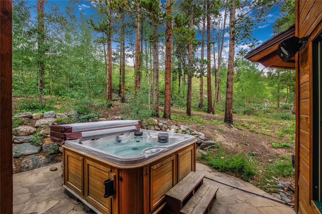 1050 4 O Clock Road Breckenridge, CO 80424 - Photo 4 of 35 a view of a sink and backyard with a barbeque