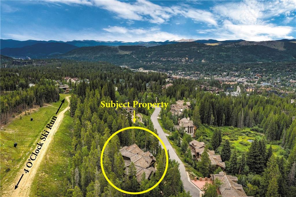 1050 4 O Clock Road Breckenridge, CO 80424 - Photo 32 of 35 a view of a lake with a mountain in the background