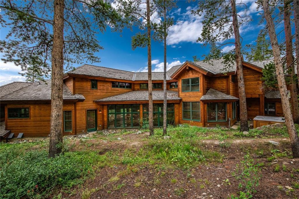 1050 4 O Clock Road Breckenridge, CO 80424 - Photo 34 of 35 a front view of a house with a garden