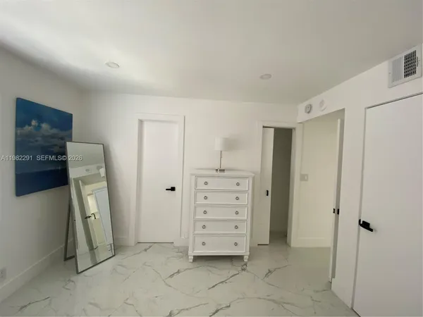 a bathroom with a sink a toilet and a bathtub