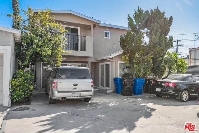 a view of car parked in front of house