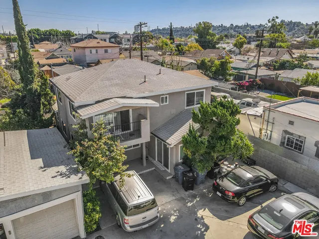 an aerial view of a house with sitting area