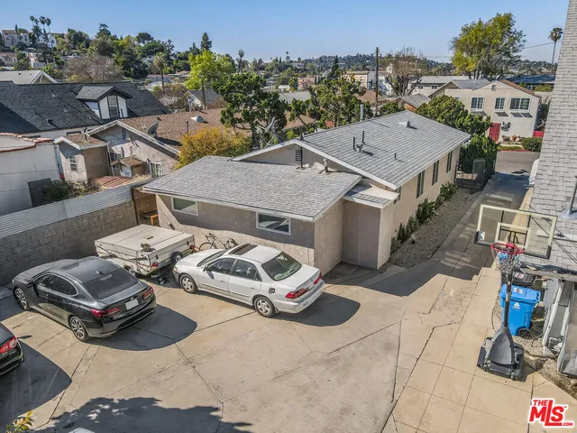 a aerial view of a house with outdoor space