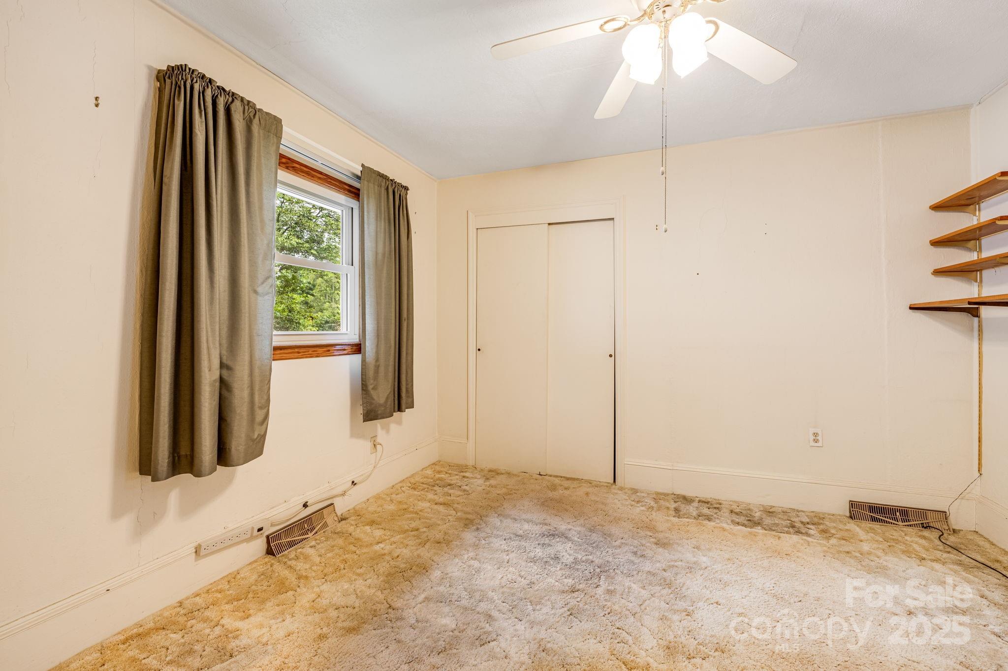 141 Macedonia Road Asheville, NC 28804 - Photo 14 of 33 a view of an empty room and window