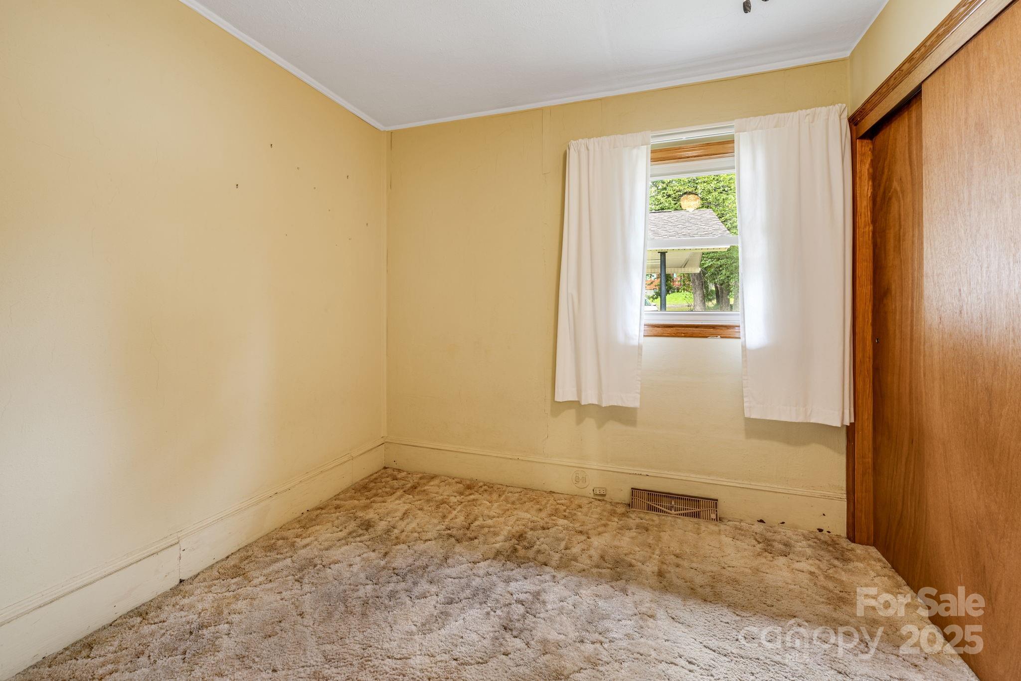 141 Macedonia Road Asheville, NC 28804 - Photo 18 of 33 a view of a room with window