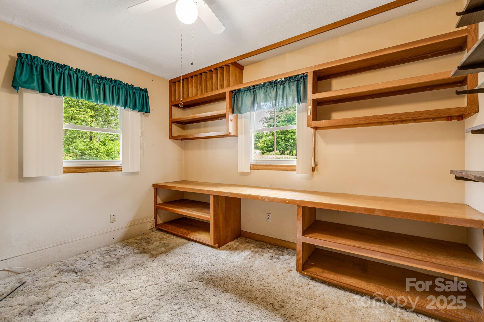 141 Macedonia Road Asheville, NC 28804 - Photo 20 of 33 a view of room with window and furniture