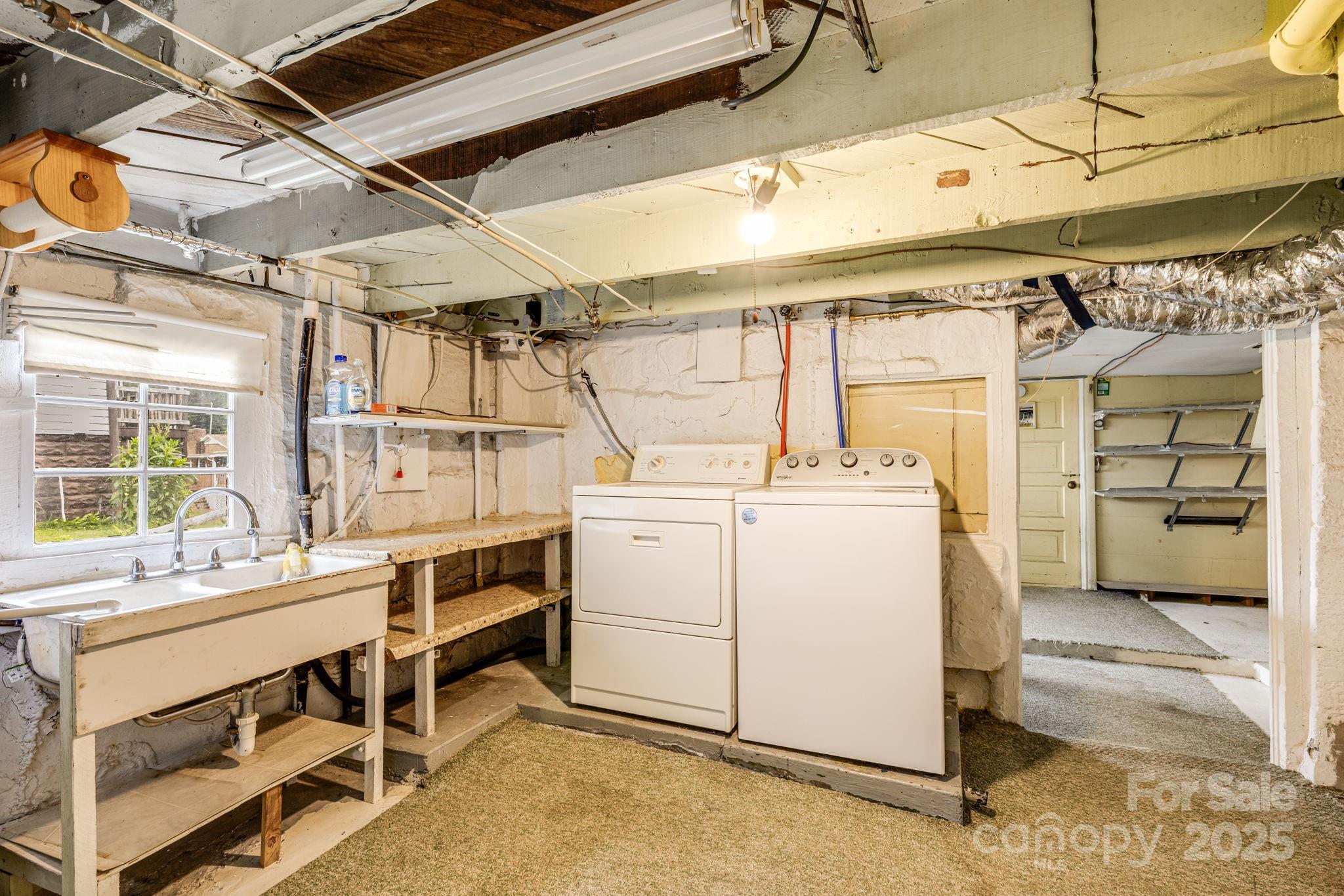 141 Macedonia Road Asheville, NC 28804 - Photo 22 of 33 a utility room with dryer and washer