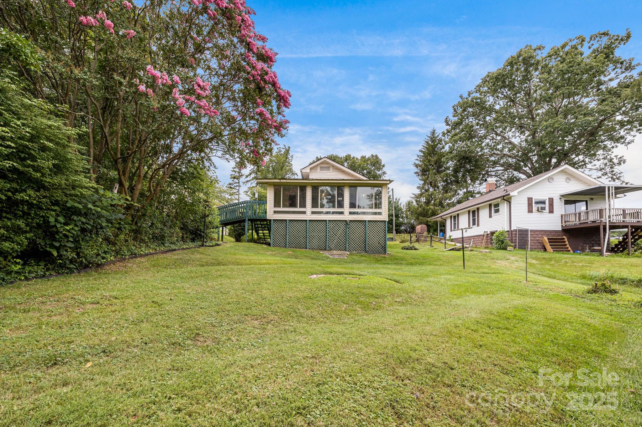 141 Macedonia Road Asheville, NC 28804 - Photo 29 of 33 a front view of a house with a garden