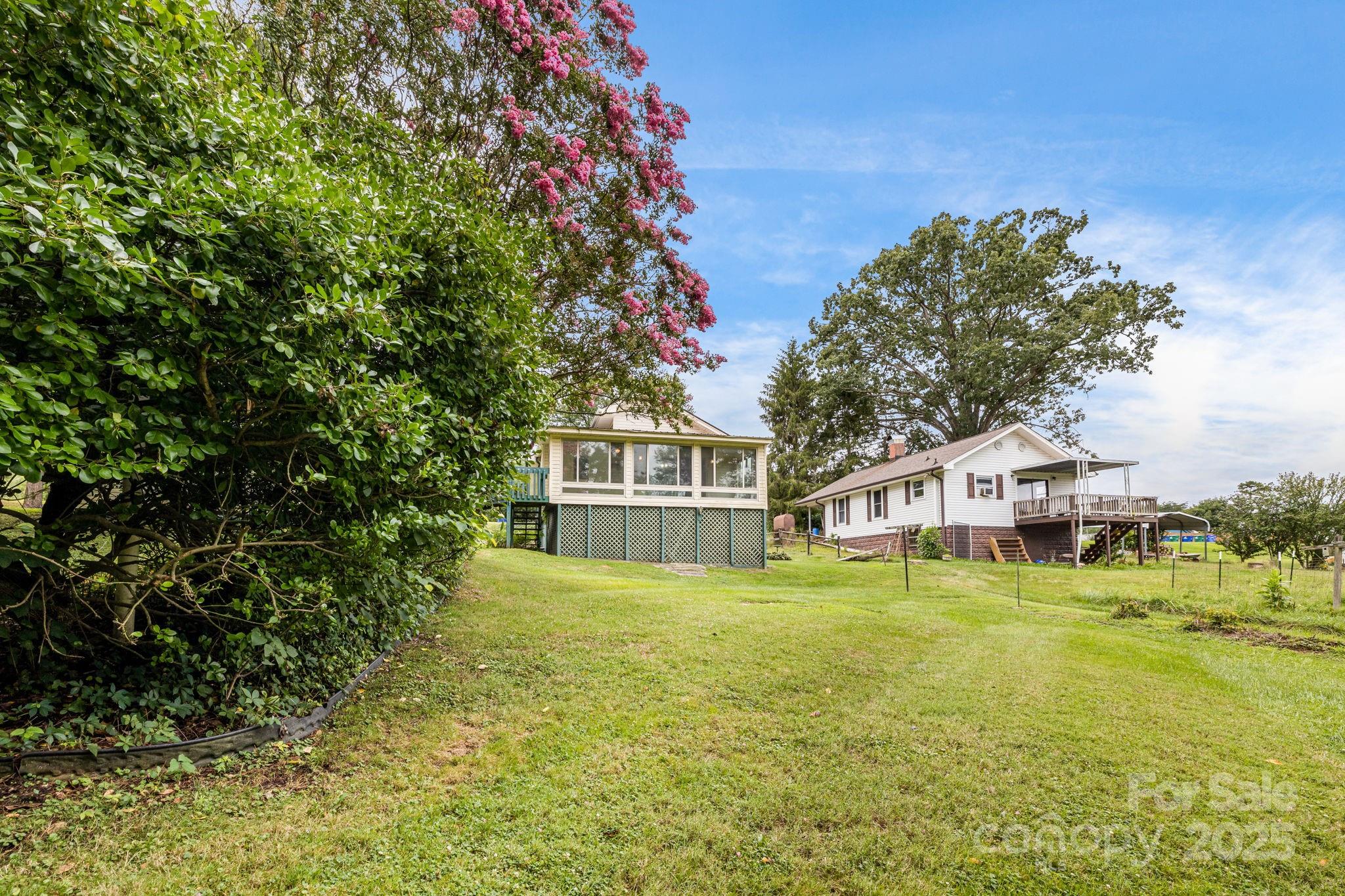 141 Macedonia Road Asheville, NC 28804 - Photo 30 of 33 a front view of a house with a garden